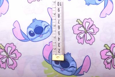 1 m bavlneného úpletu v bielej farbe s rozprávkovou postavou Stitch DS-KUP147 (1)